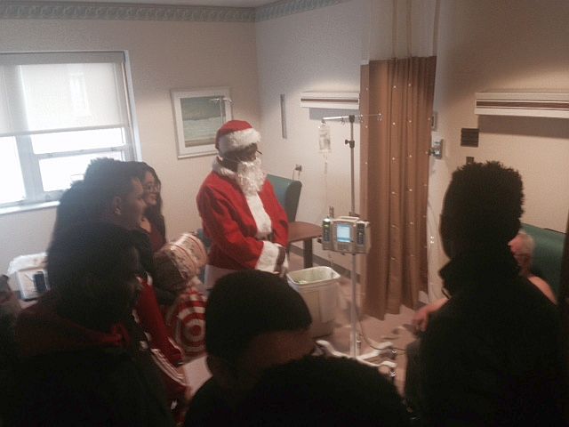 Caroling, gift-giving, and spreading holiday cheer @ St. Margaret's Hospital